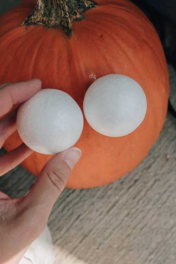 21 Halloween decor Ideas to Unleash your Creativity - Decor Hint styrofoam balls on a pumpkin