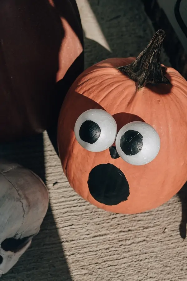 21 Halloween decor Ideas to Unleash your Creativity - Decor Hint styrofoam balls on a pumpkin