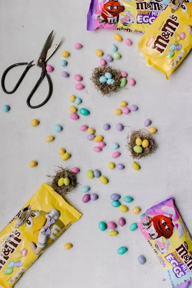 Make this Charming DIY Easter Tree with M&M's - Decor Hint DIY little handmade bird nests - with M&M candies as the eggs.