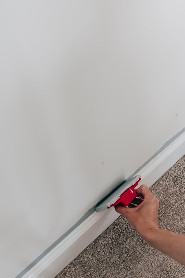 usingga paint edger on baseboards 