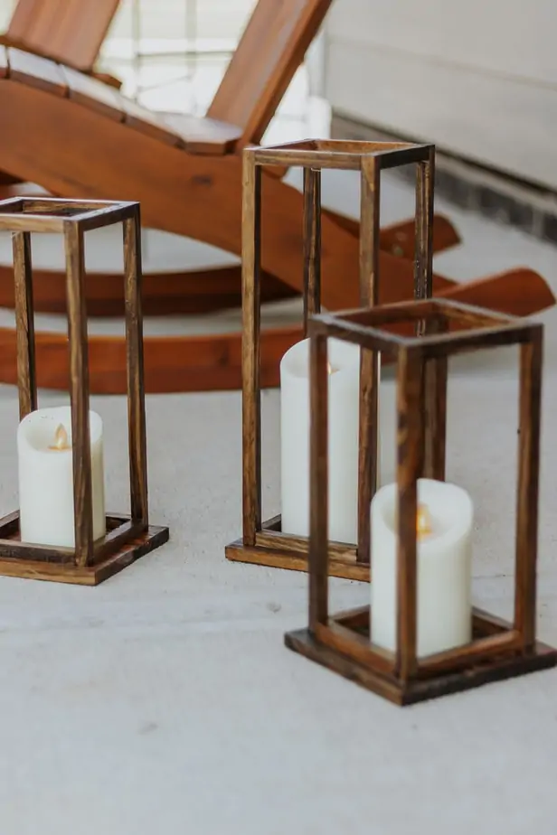 Pretty DIY Wood Lanterns - Decor Hint a set of three DIy Wood Lanterns on a front porch