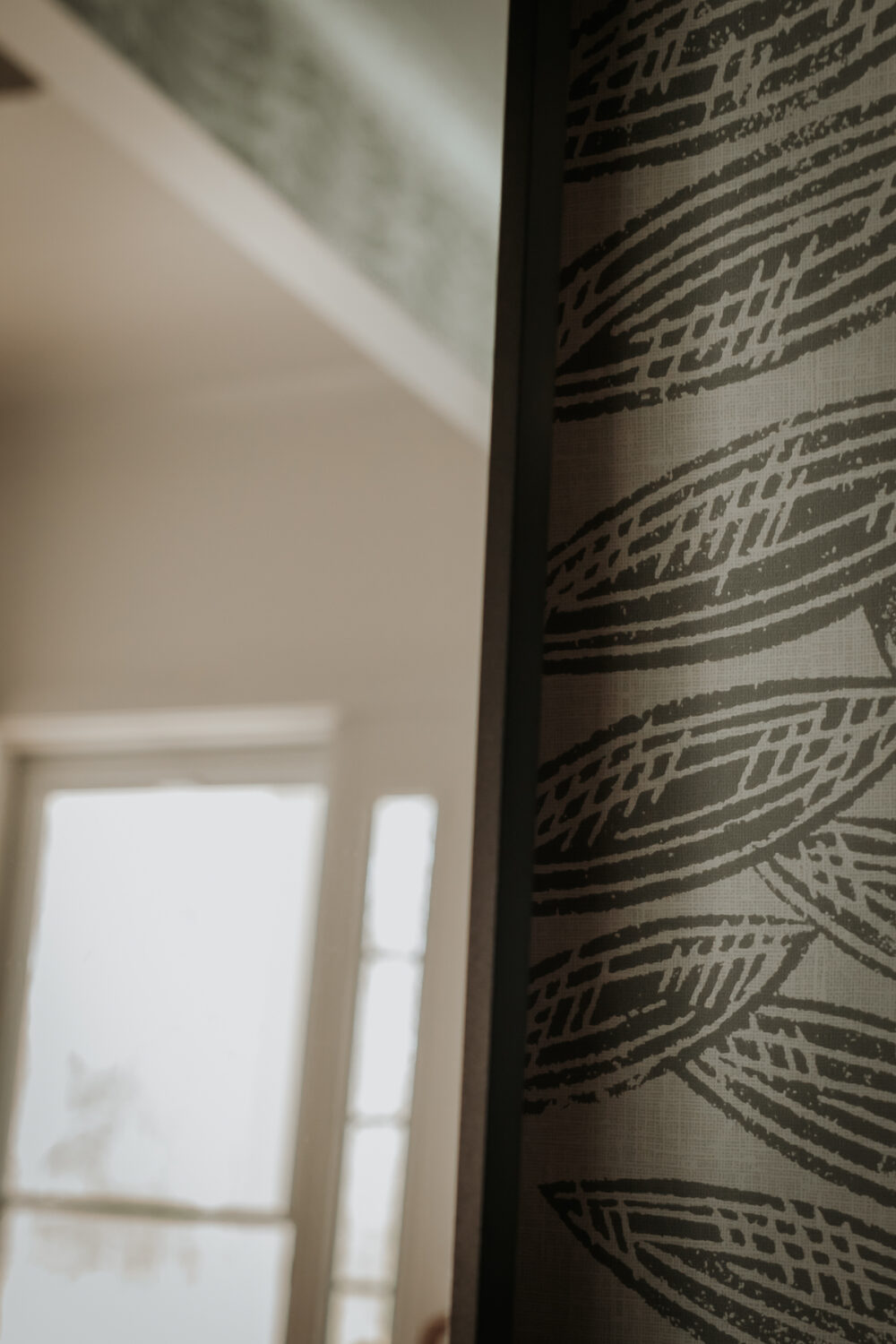 Check Out Our Stunning New Dining Room Addition - Decor Hint close up view of black frame around mirror