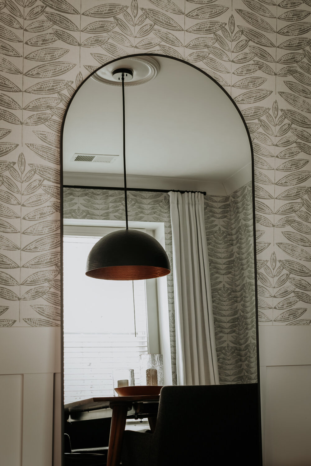 Check Out Our Stunning New Dining Room Addition - Decor Hint arched mirror with black trim on a wall