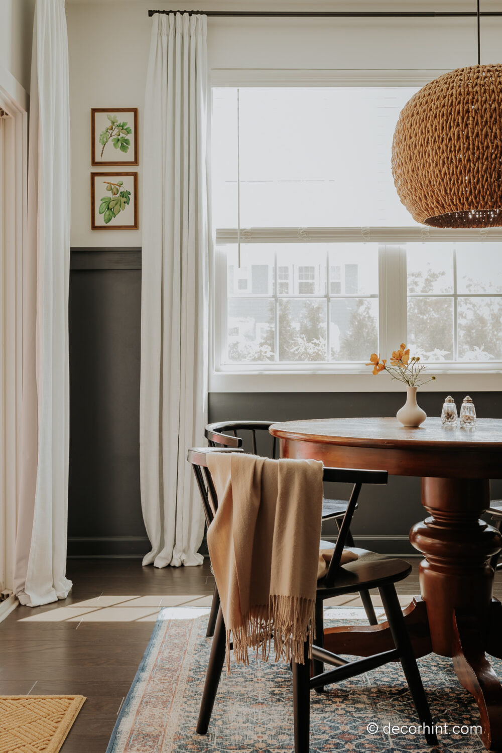 Breathe Life into Your Breakfast Nook with These Easy Ideas - Decor Hint a view of a breakfast nook with a table and chairs and white curtains