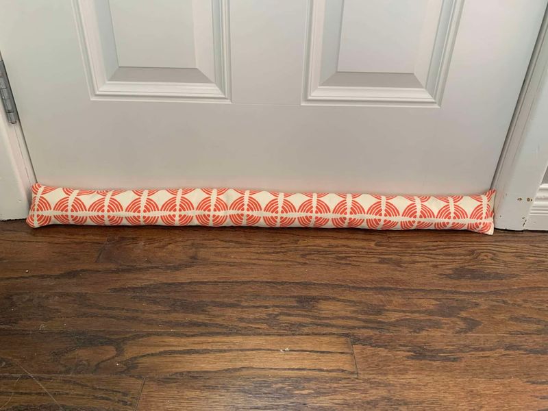 10 Wyoming Log Cabin Tricks That Keep It Cozy - Decor Hint Draft-Stopping Door Snakes