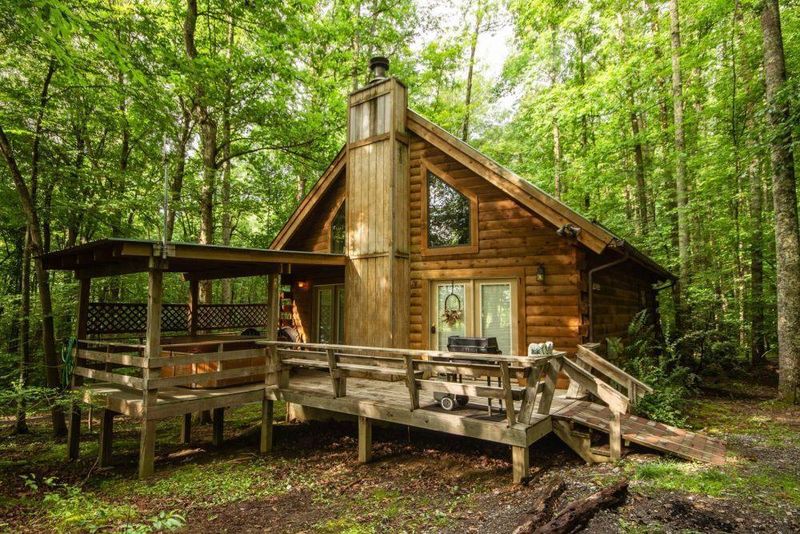 Rustic Log Cabins by the River