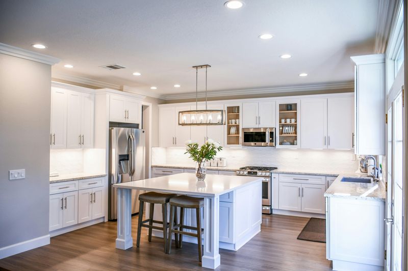 7 Kitchen Design Choices Homeowners Are Tired Of Seeing - Decor Hint All-White Kitchens That Blind You