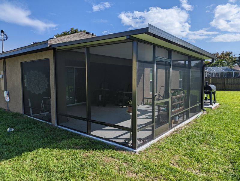 8 Florida Screened Porches That Survive Storm Season - Decor Hint Aluminum-Framed Fortress