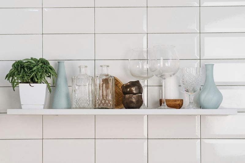 9 Simple Ways You Can Add Visual Appeal To A Kitchen Island - Decor Hint Create A Floating Shelf Display
