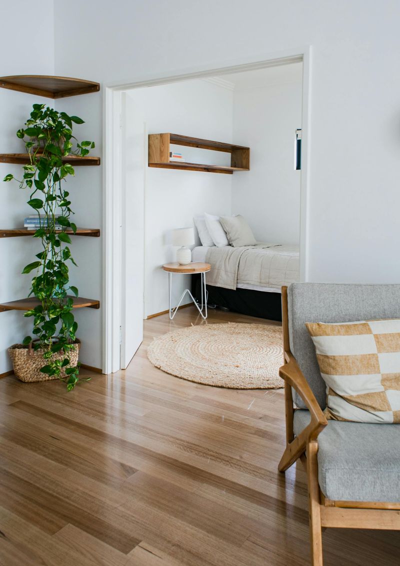 13 Ways Designers Place Furniture To Keep Rooms Light And Inviting - Decor Hint Light Rugs to Brighten Dark Floors