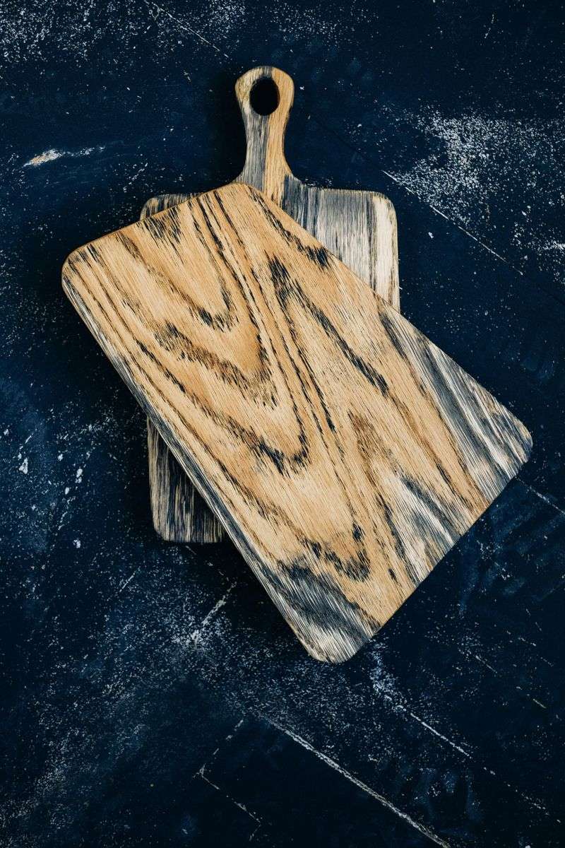 9 Simple Ways You Can Add Visual Appeal To A Kitchen Island - Decor Hint Display Artisan Cutting Boards
