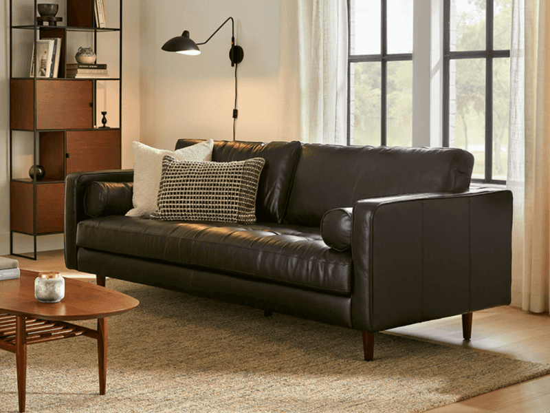 10 Sofa Color Mistakes LA Homeowners Are Regretting In 2025 - Decor Hint Black Leather in Small Spaces