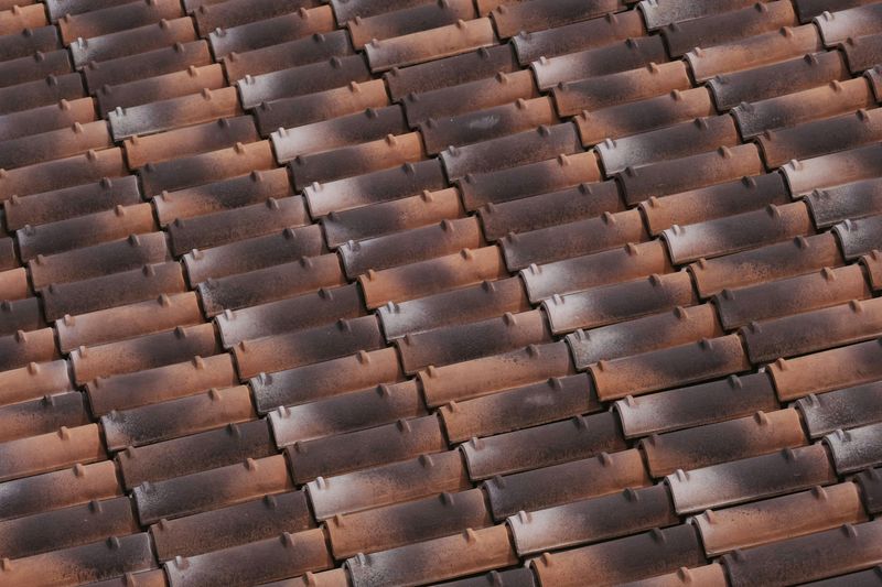 7 Yearly Home Maintenance Jobs That Could Make Life Easier - Decor Hint Inspecting Roof for Damage