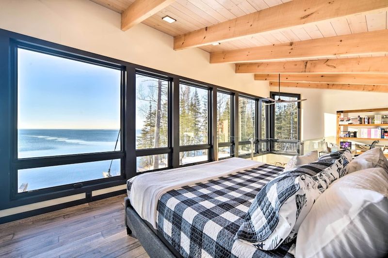9 Minnesota Cabins That Might Feel Perfectly Cozy All Year - Decor Hint Cabin with Large Panoramic Windows