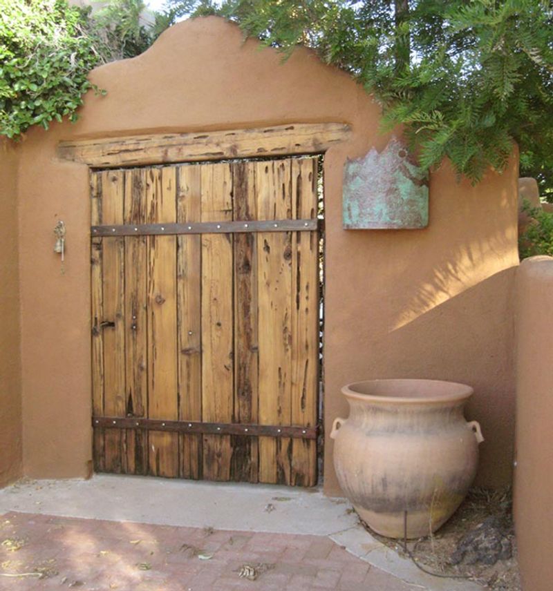 7 Arizona Adobe Homes That Could Make You Rethink Desert Design - Decor Hint Intricately Carved Wooden Doors