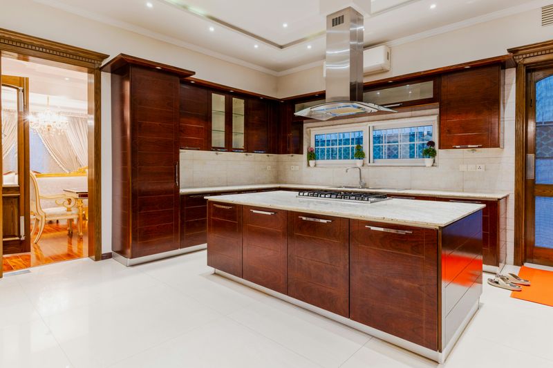 7 Kitchen Design Choices Homeowners Are Tired Of Seeing - Decor Hint Range Hoods Bigger Than Your Car