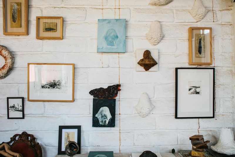 9 Common Decorating Mistakes That Can Make Your Home Look Cheap - Decor Hint Artwork Hanging At Awkward Heights