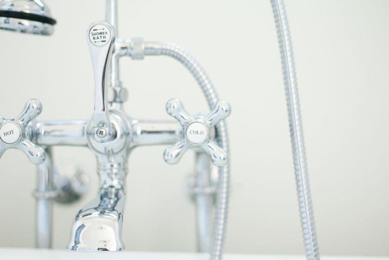 20 Vintage Bathroom Trends Rocking Pennsylvania Homes - Decor Hint Telephone-Style Shower Fixtures Ring True