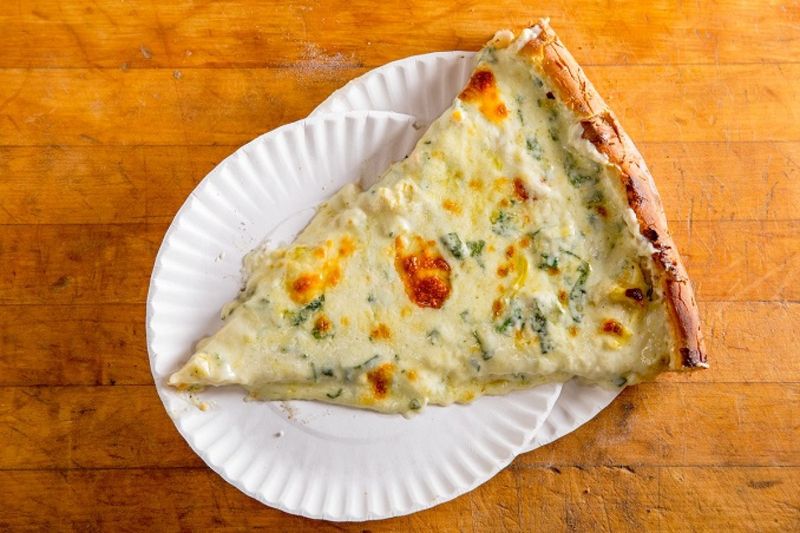 7 Classic New York Pizza Chains Keeping Tradition On The Menu - Decor Hint Artichoke Basille's Pizza: Late-Night Slice Innovation