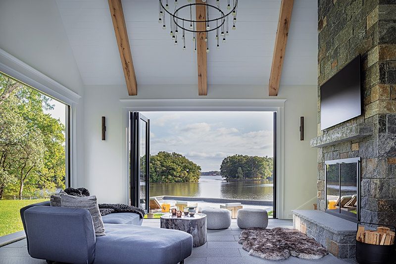 8 Michigan Lake Houses Where The Décor Matches The Breathtaking Views - Decor Hint Lake Charlevoix's Industrial Chic Boathouse