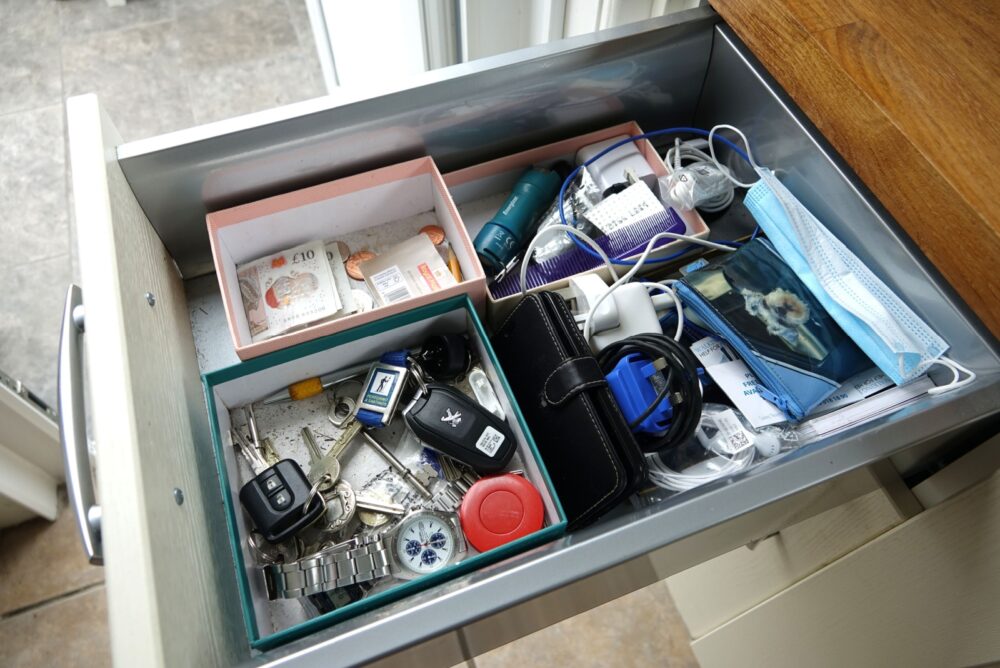 11 Bad Habits That Can Slowly Make Your Home Feel Cluttered - Decor Hint Junk Drawer Jungle