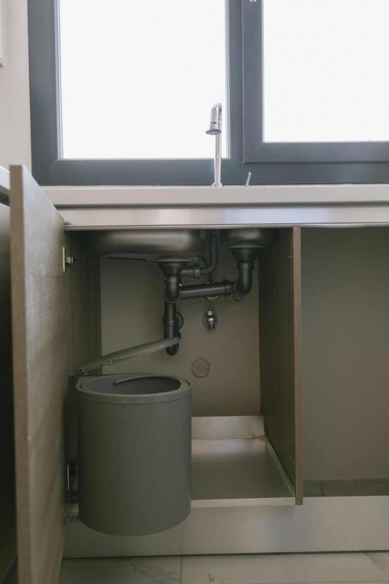 9 Simple Home Maintenance Tasks That Can Prevent Damage - Decor Hint Check For Leaks Under Sinks Quarterly