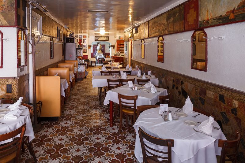 11 Unforgettable Hole-In-The-Wall Restaurants In New York - Decor Hint John's of 12th Street
