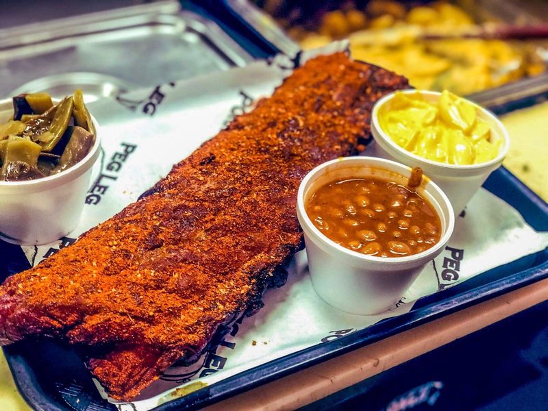 10 Tennessee Barbecue Joints Where The Smoke Still Speaks - Decor Hint Peg Leg Porker - Nashville