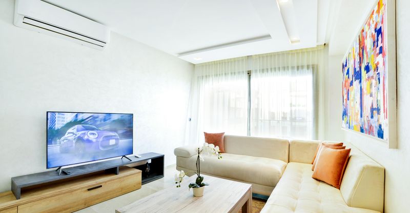 13 Ways Designers Place Furniture To Keep Rooms Light And Inviting - Decor Hint Angled Sofas to Encourage Conversation