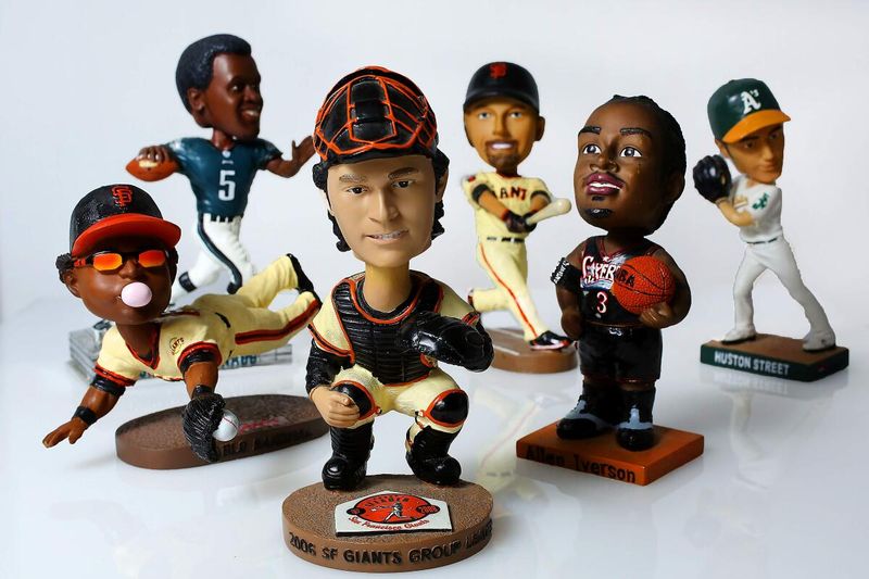 In Georgia, 16 Collectibles On The Decline For 2025 And 6 That Are No Longer Worth Anything - Decor Hint Georgia Sports Team Bobbleheads Wobbling