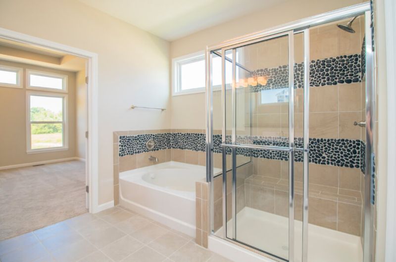 Shower-Tub Combos With Glass Doors Create Tension