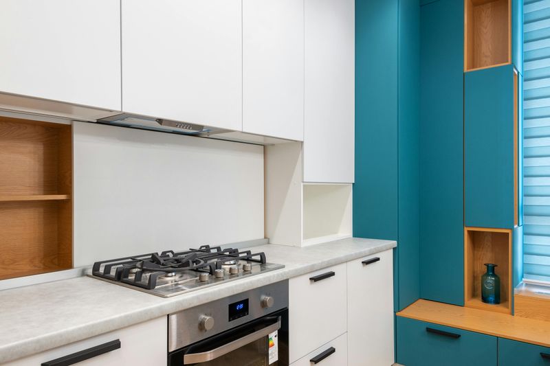 13 Small Tweaks That Instantly Make A Rental Kitchen Cozier - Decor Hint Swap out cabinet knobs and handles