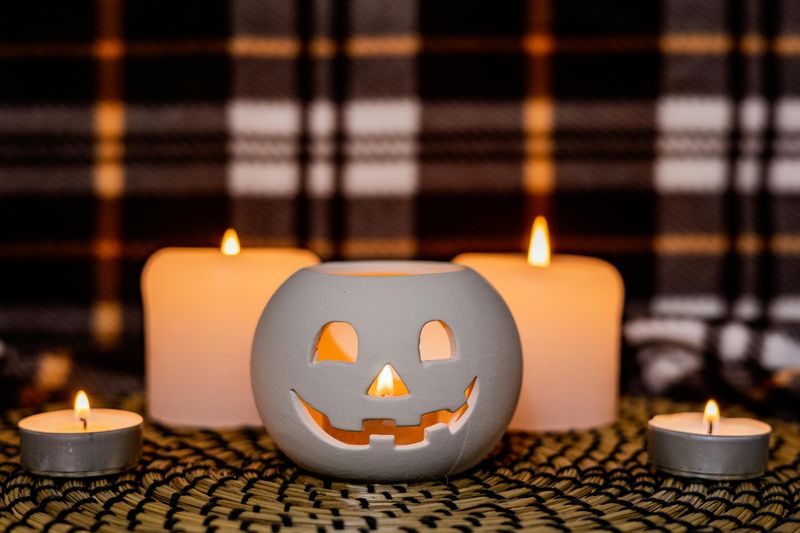 11 Cozy Halloween Decor Ideas That Work All Season Long - Decor Hint Pumpkin Candle Holders