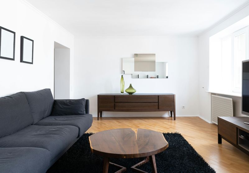 11 Mistakes That Can Make A Living Room Feel Smaller Than It Is - Decor Hint Wall-Hugging Furniture Arrangement