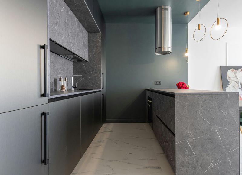 12 Concrete Counter Ideas That May Be Just What Your Kitchen Needs - Decor Hint Polished gray concrete countertops