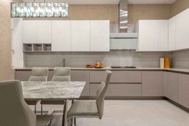 Sleek, Handleless Cabinetry Takes Center Stage