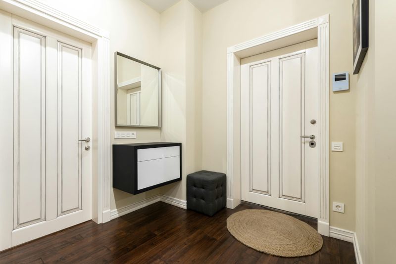 6 Flooring Styles That Could Make Your Home Seem Older - Decor Hint Dark, Glossy Hardwood