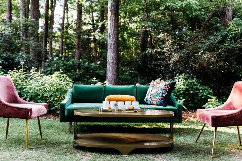 6 Miami Outdoor Patios Styled In Bold Autumn Jewel Tones - Decor Hint Riverside Emerald Oasis