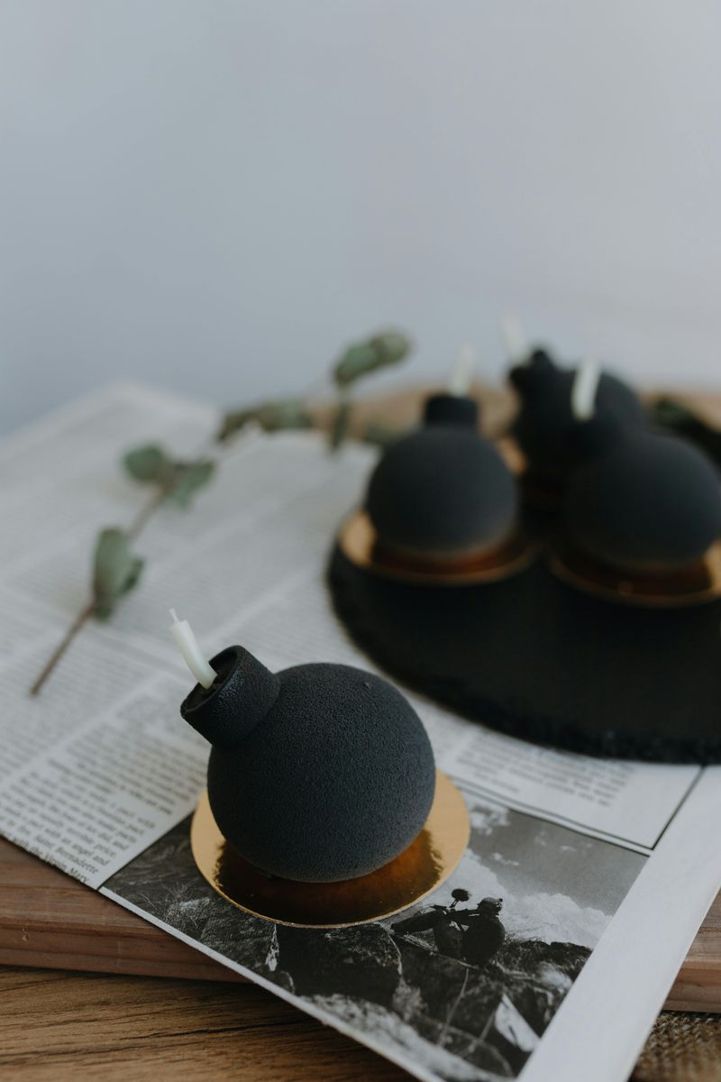 Black Candles In Simple Holders