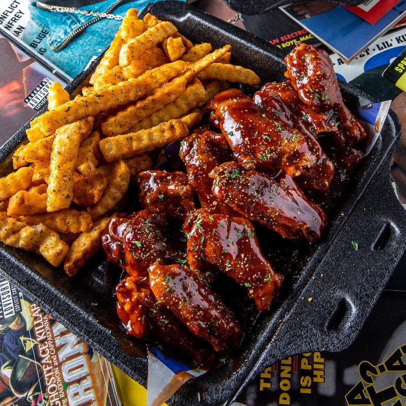 11 Places In Atlanta Where Lemon Pepper Wings Might Impress - Decor Hint Wild Wing Café – Party Spot With Serious Wing Game