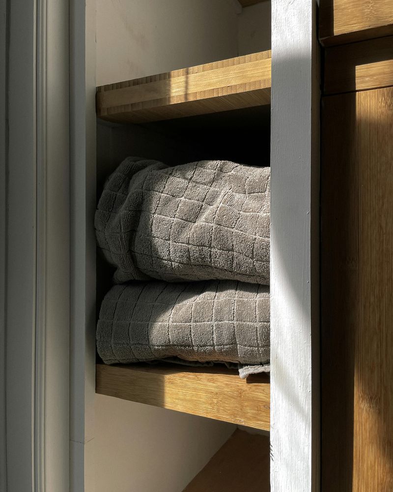 9 Space-Saving Towel Storage Tips That Could Transform Your Bathroom - Decor Hint Stack Towels Vertically in Drawers