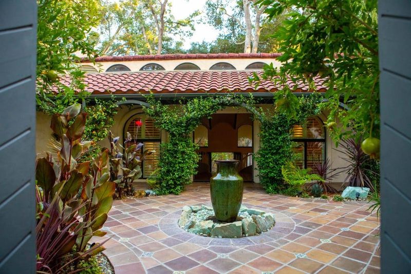6 Miami Outdoor Patios Styled In Bold Autumn Jewel Tones - Decor Hint Little Havana Vintage Courtyard