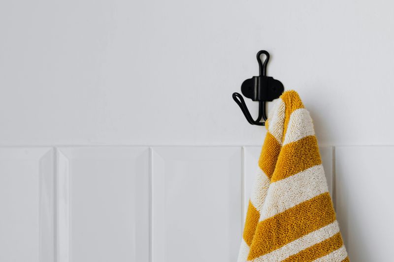16 Budget Bathroom Tricks That Might Make A Big Impact - Decor Hint Wall Hooks: Functional and decorative