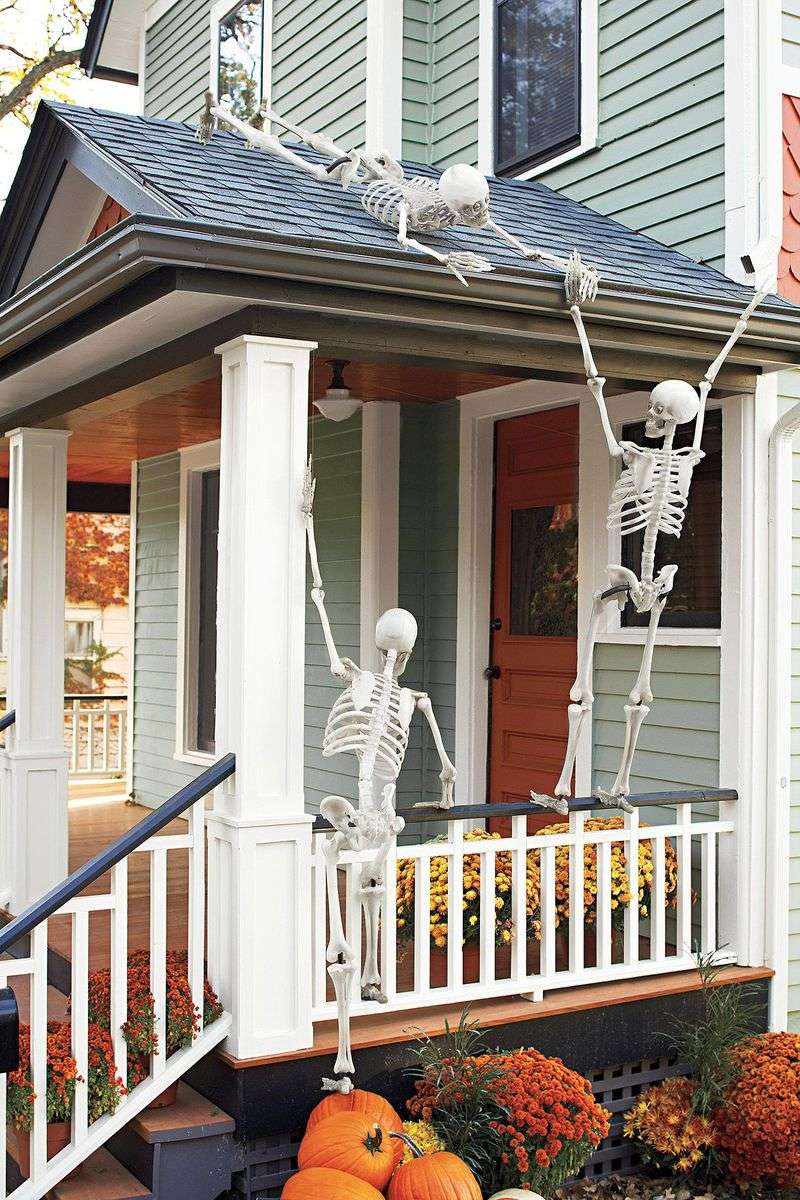 Skeletons Climbing The House Or Roof