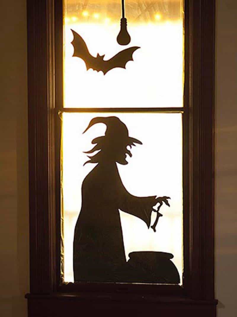 Silhouetted Witch And Bat Scene