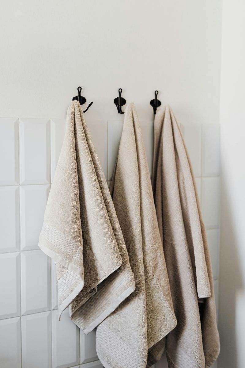 13 Bathroom Choices That Could Undermine Your Design - Decor Hint Using mismatched towel bars and hooks
