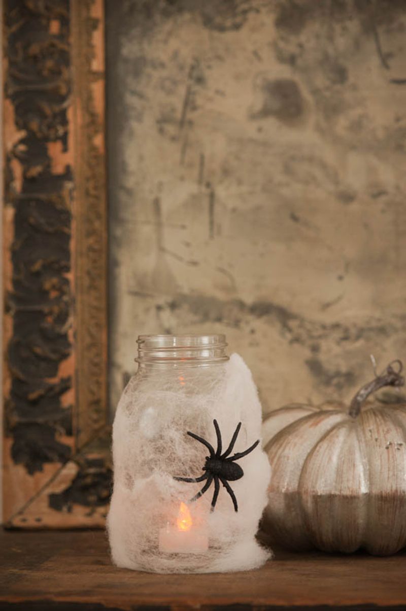 Mason Jar Lights With Faux Spider Webs Inside