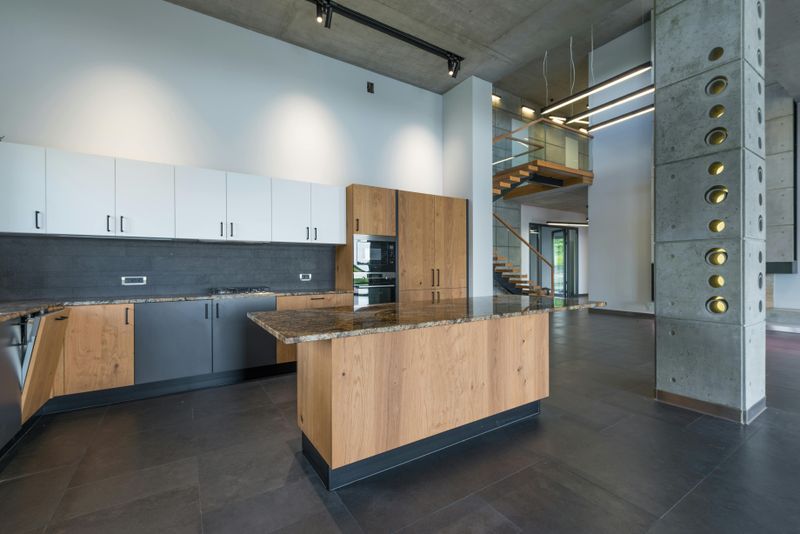 12 Concrete Counter Ideas That May Be Just What Your Kitchen Needs - Decor Hint Stained concrete in warm tones