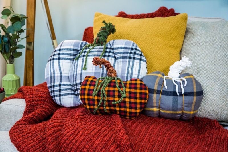 Plaid Blankets And Pumpkin Pillows