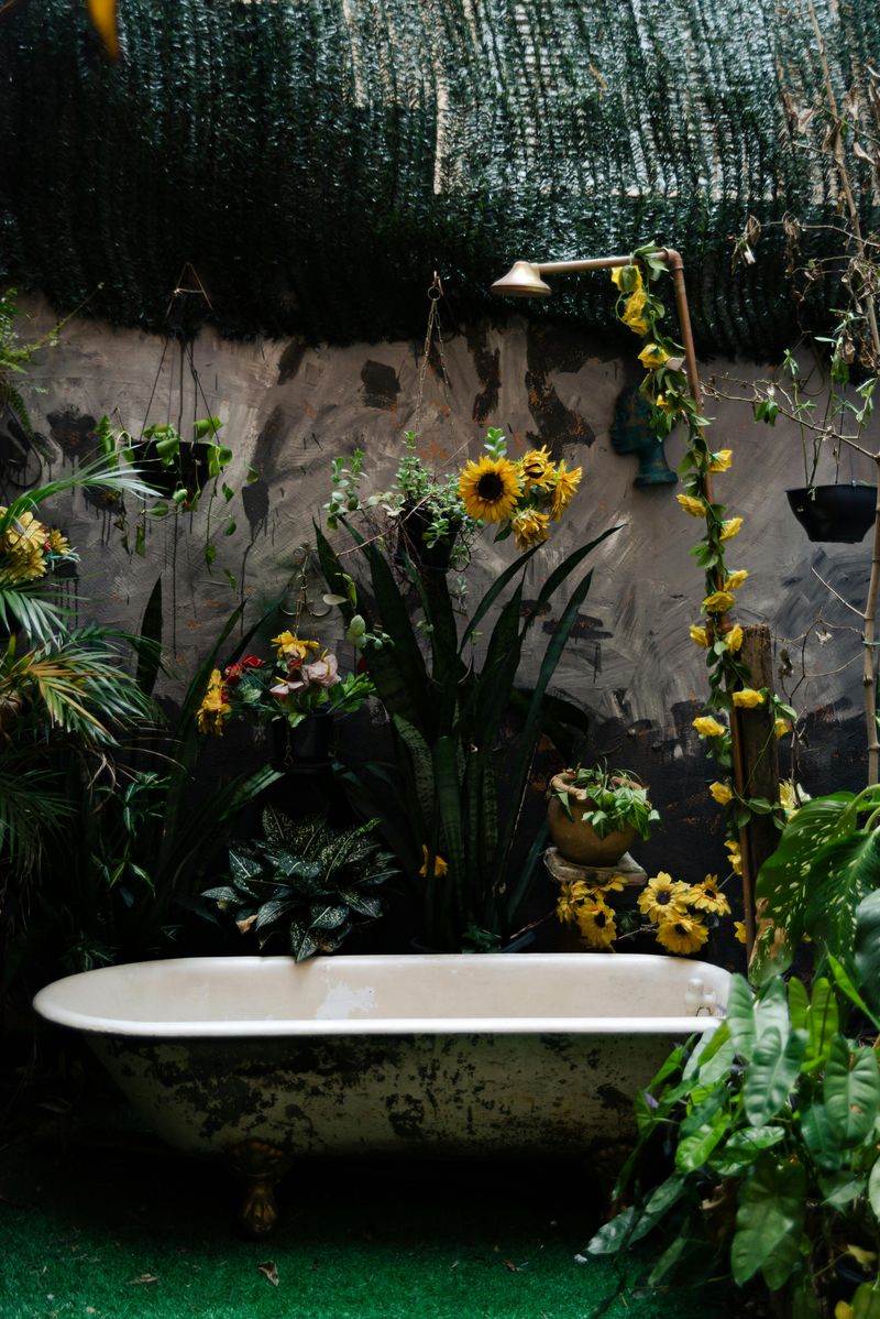 6 Smart Upcycling Tips That Could Give Your Backyard A Fresh Look - Decor Hint Turn a Bathtub Into a Small Pond or Planter
